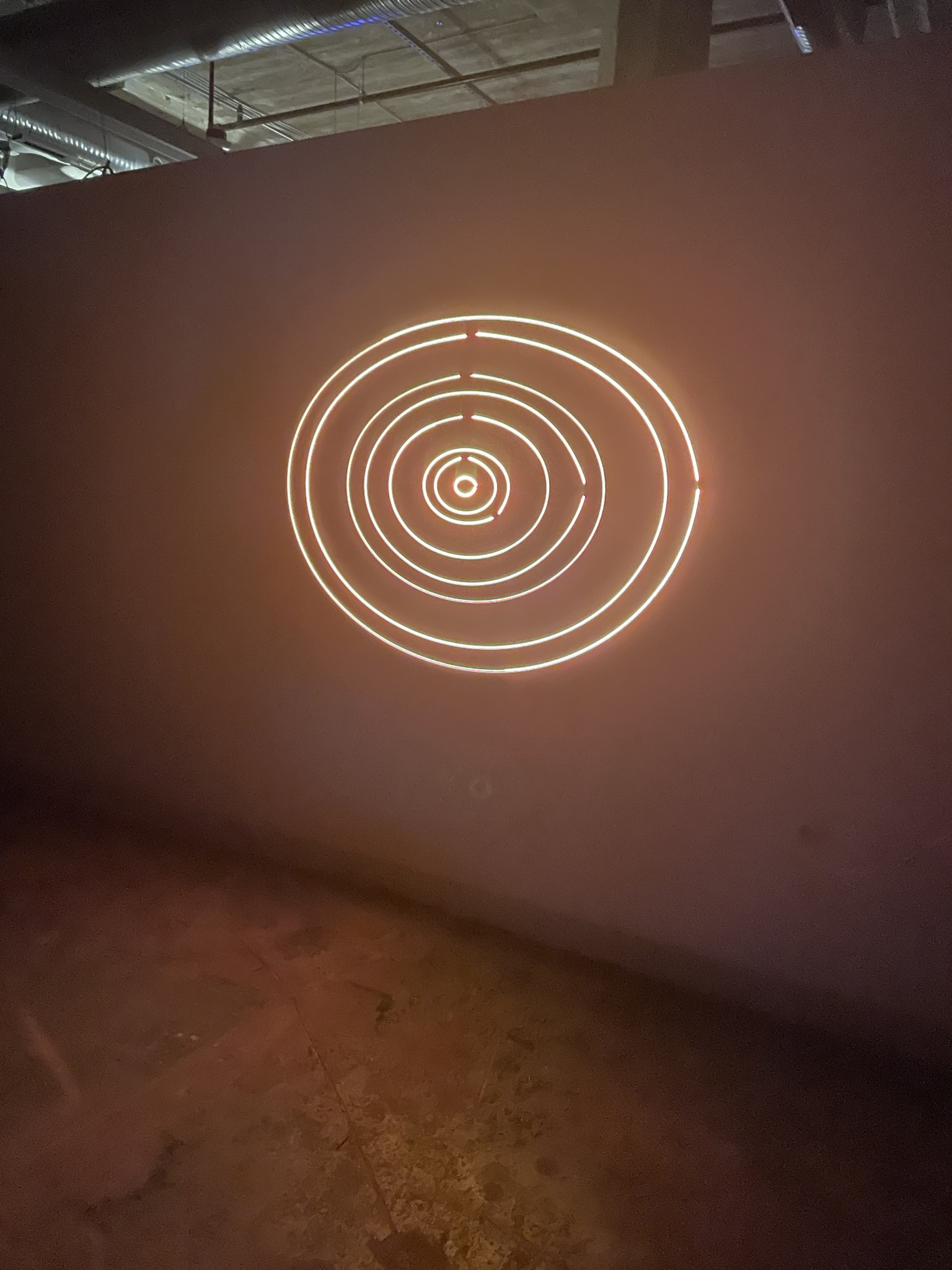 An image of a laser projection of concentric rings.